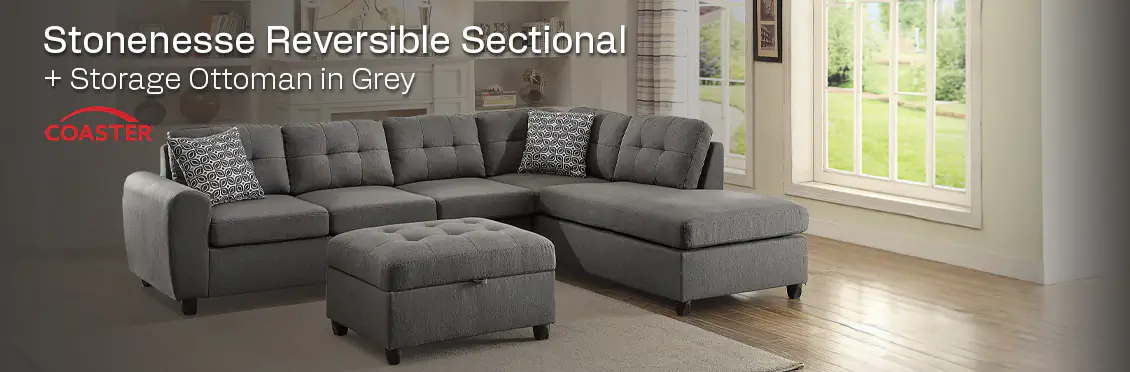 Stonenesse Reversible Sectional + Storage Ottoman in Grey  - Click for more details