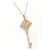 Gold Tone Intricately Textured Key Pendant Necklace