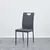 Diniro A set of 4 leather dining chairs with cushion and high back