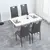 Diniro A set of 4 leather dining chairs with cushion and high back